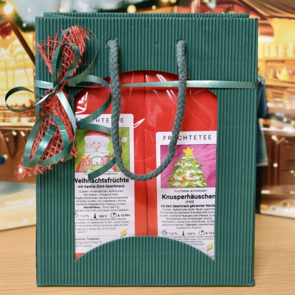 Weihnachts-Teeset Geschenktüte, zwei beliebte winterliche Früchtetees in einer festlichen Geschenktüte, ideal zum Verschenken oder selbst genießen.